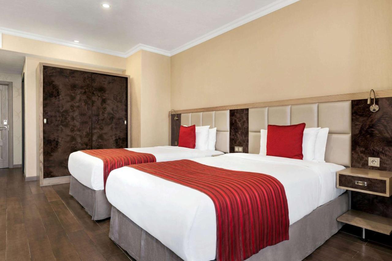 Готель Ramada By Wyndham Bishkek Centre Екстер'єр фото